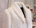 View wedding jackets, shrugs, cuffs and gloves